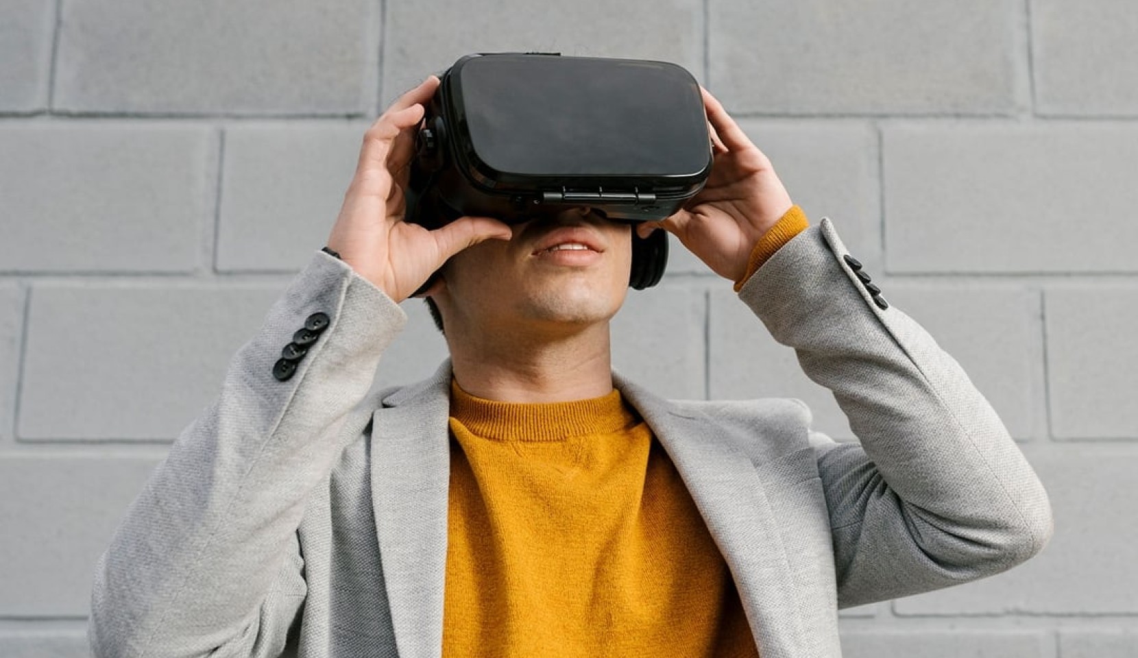 man using black VR goggles